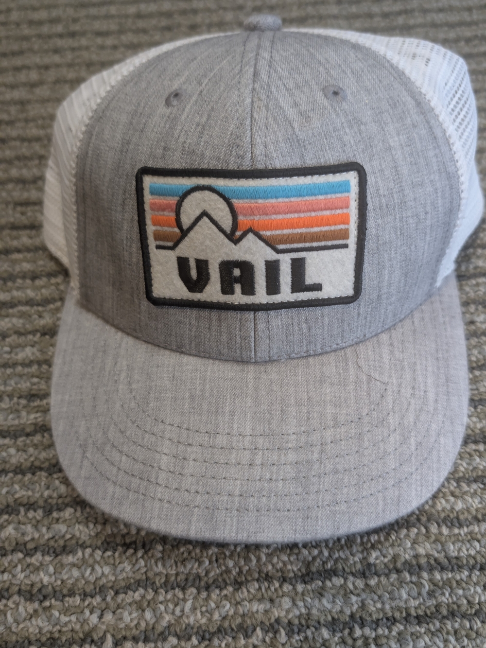 Legacy Grey and White Trucker Hat with Colorful Stripe Patch